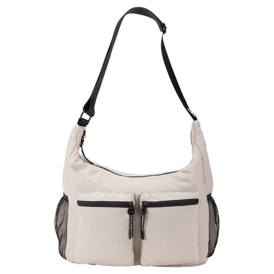 Product Image – Bench Nylon Hobo Bag in light beige with two front zip pockets, mesh sides, and adjustable shoulder strap.