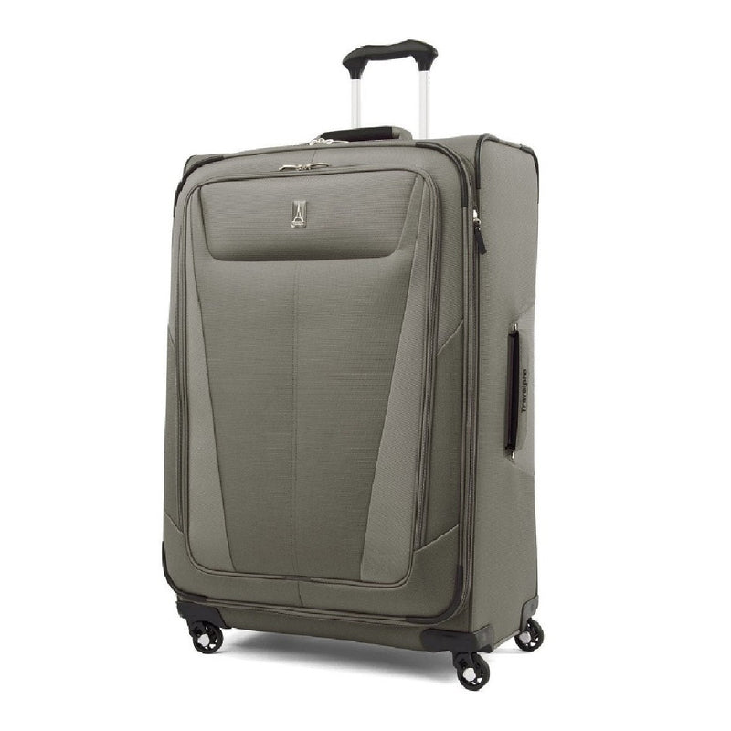 Image showing olive coloured luggage piece with silver and black carrying handle extended.