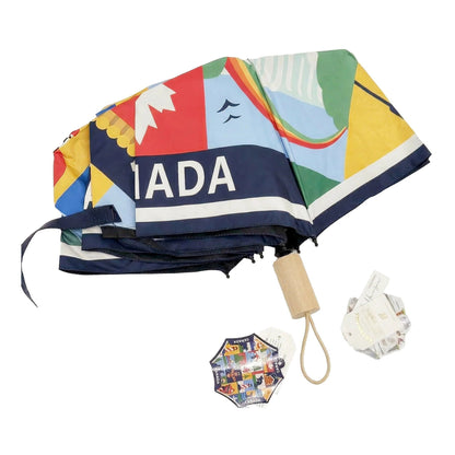 Northern Icons Canada Heritage Icon Collage Folding Umbrella - closed view.