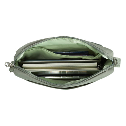Inside view of moss Travelon Roam Anti-theft East/West Crossbody with books and phone inside.