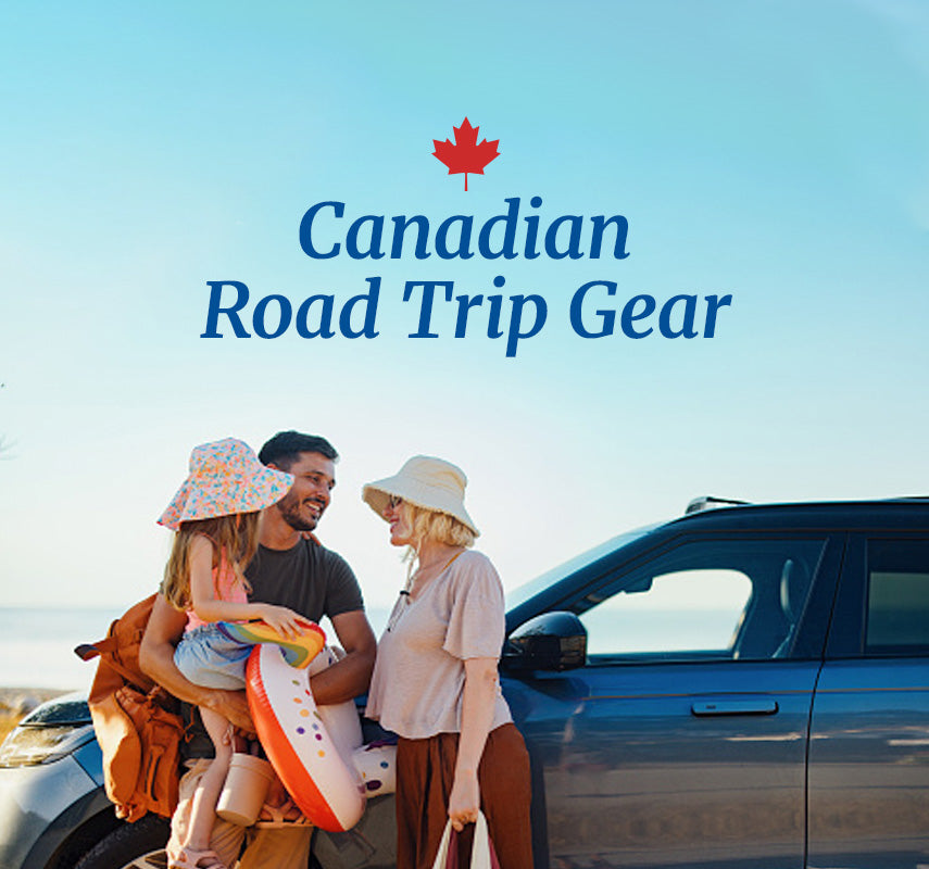 Canadian Road Trip Gear - family parked by a beach, standing on the side of a car ready to go.