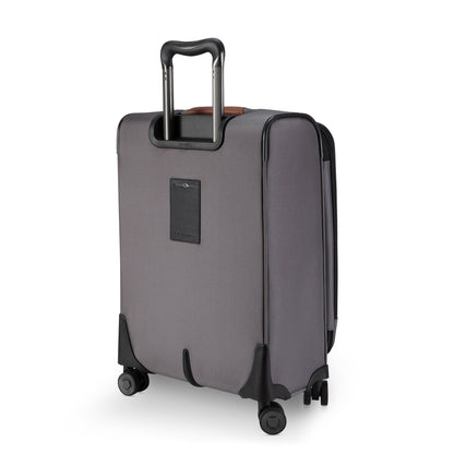 Ricardo Beverly Hills Montecito 3.0 gray softside carry-on with four wheels, black trim, and telescopic handle (back view).