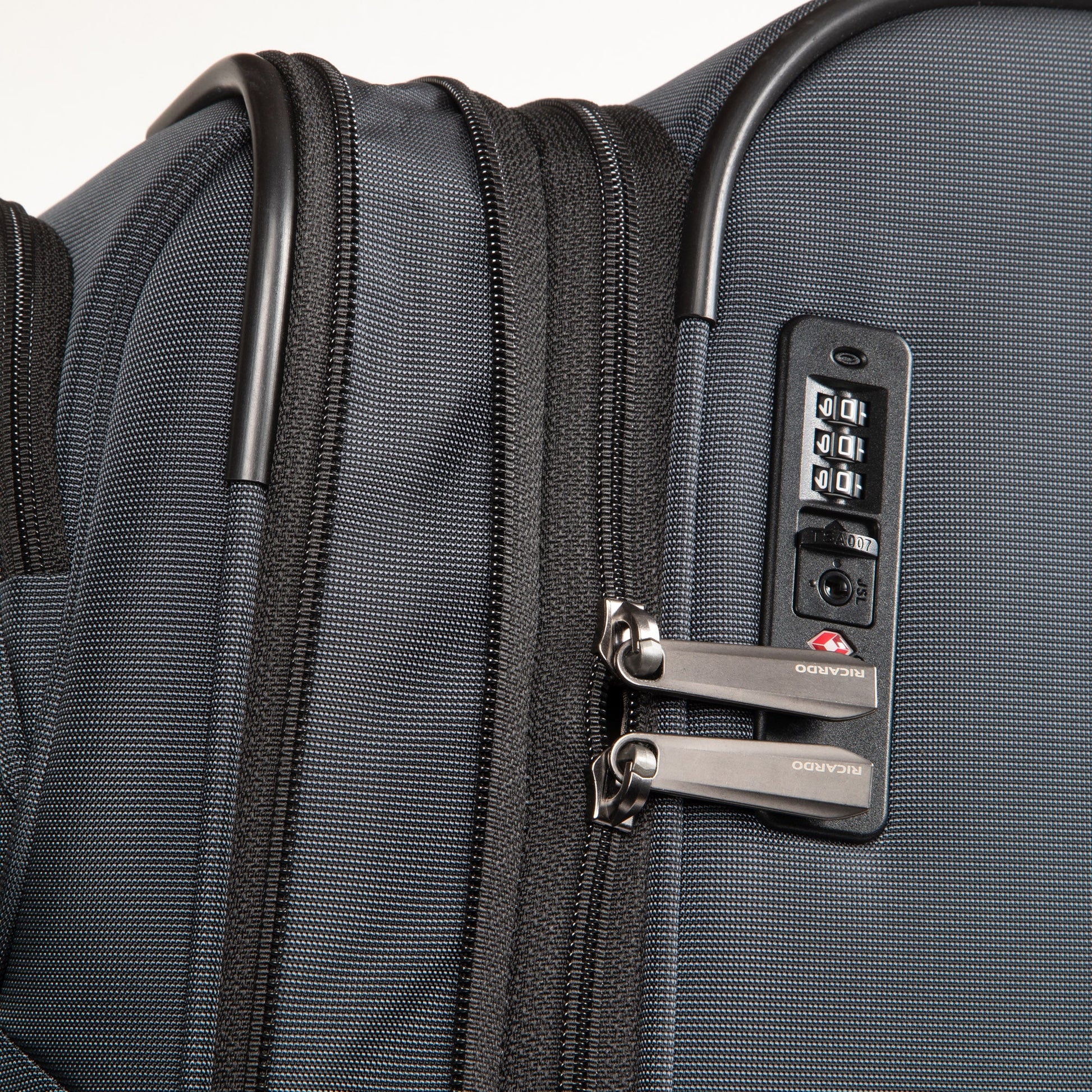 Close-up of the Ricardo Beverly Hills Montecito 3.0 Softside Carry-on with dual zippers and TSA combo lock.