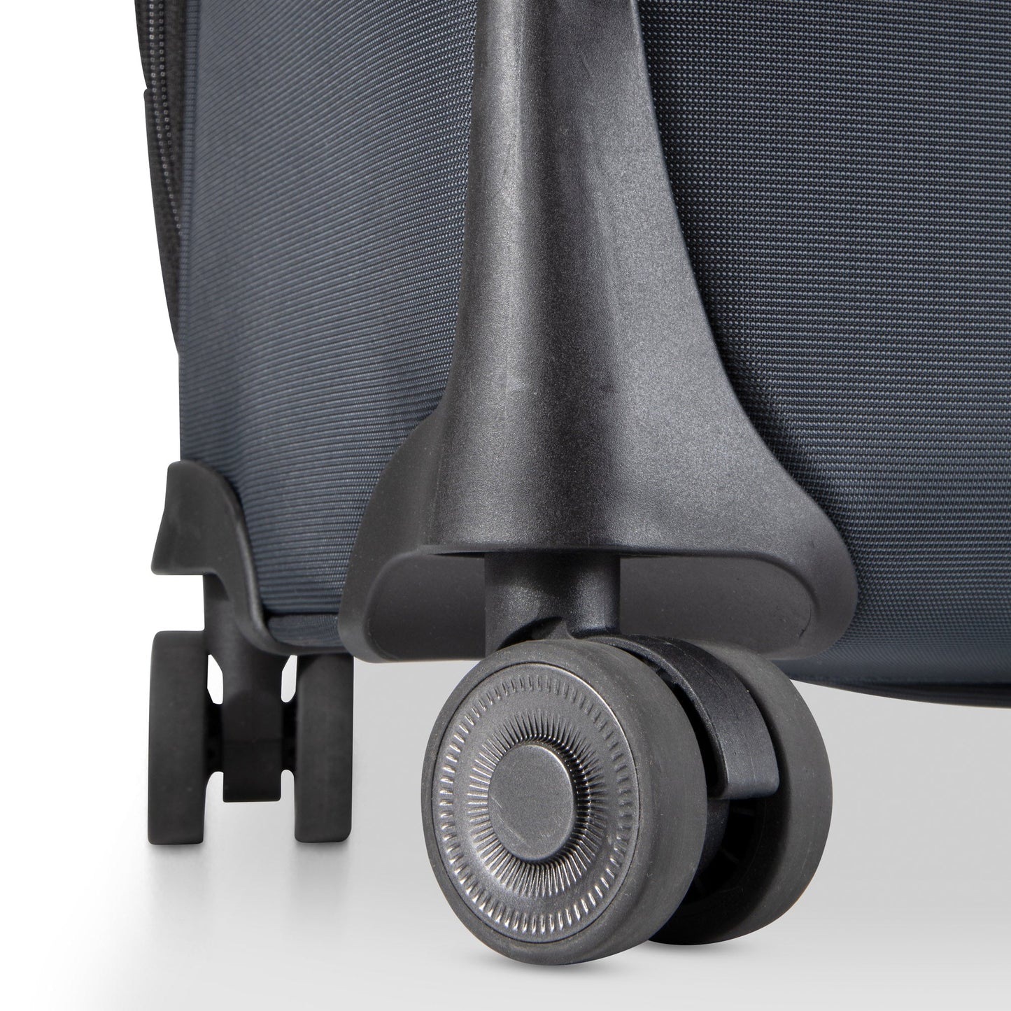 Close-up of the Ricardo Beverly Hills Montecito 3.0 spinner wheel, showing its textured, durable material and plastic parts.