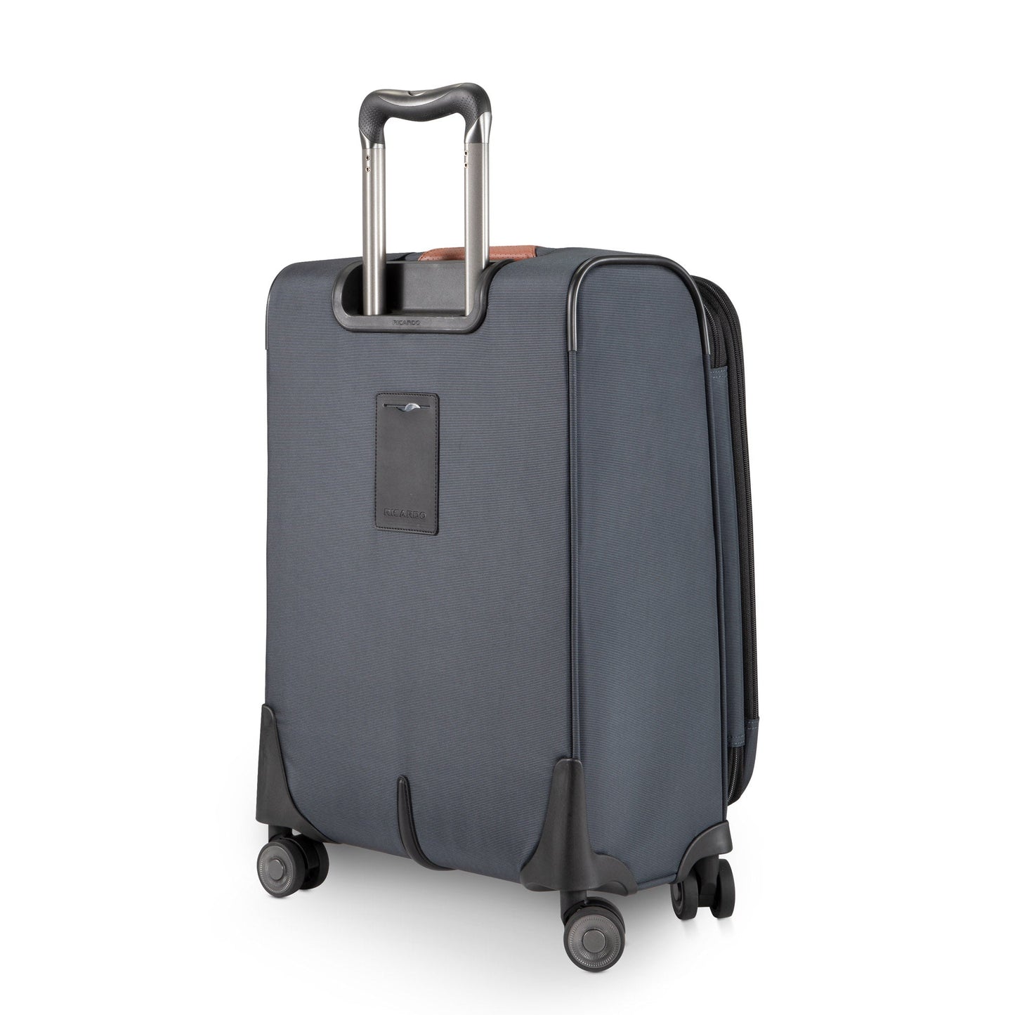 The Ricardo Beverly Hills Montecito 3.0 gray softside carry-on spinner stands upright with four wheels and an extended handle.