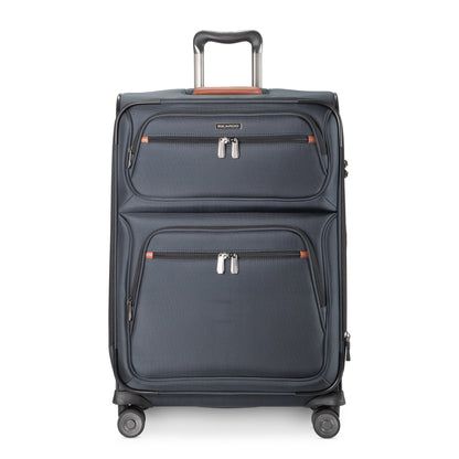 Front view of Ricardo Beverly Hills Montecito 3.0 navy expandable suitcase with two pockets and four wheels.