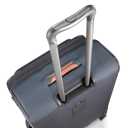 Top view of Ricardo Beverly Hills Montecito 3.0 Medium Check-In Spinner with extended telescopic handle.