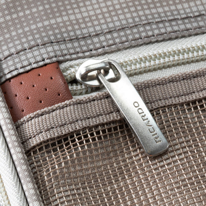 Close-up of a zippered pocket on Ricardo Beverly Hills Montecito 3.0 Softside Medium Check-In Spinner luggage.
