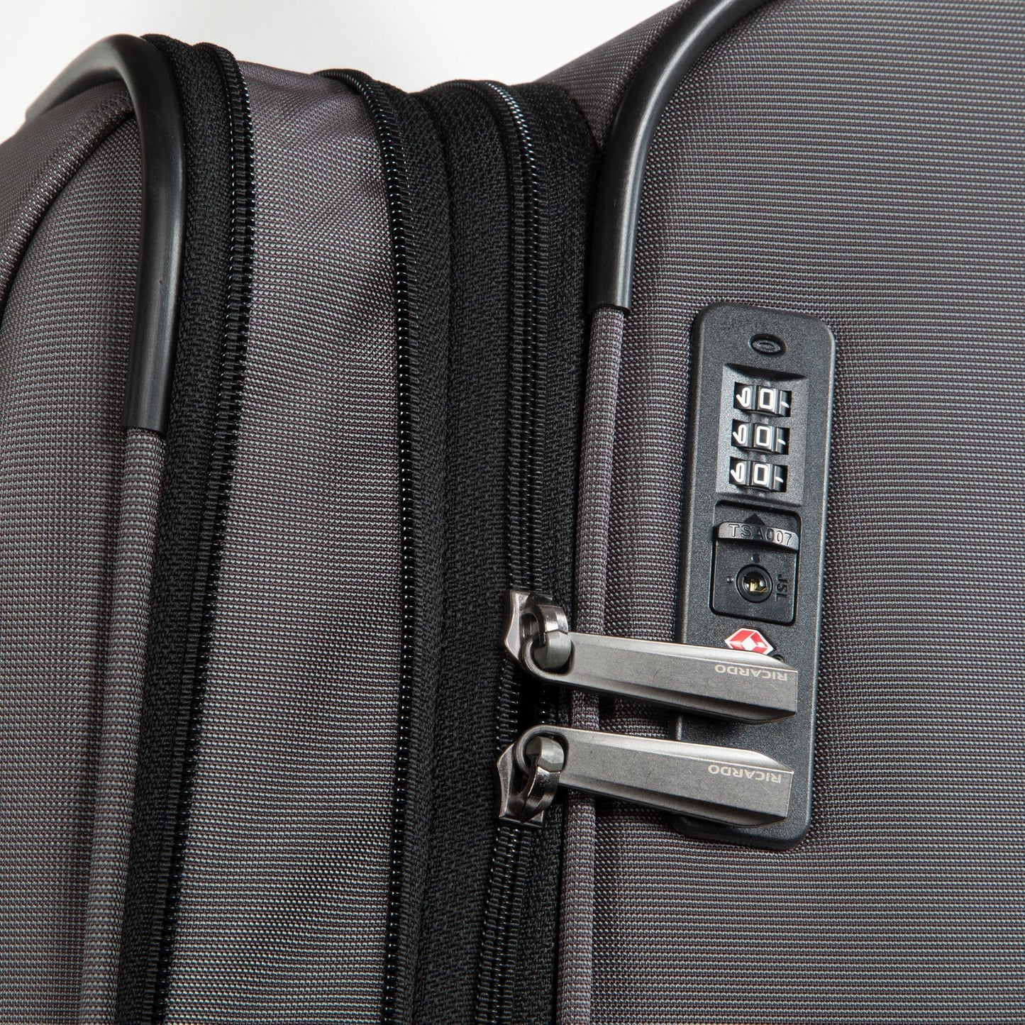 Close-up of the Ricardo Beverly Hills Montecito 3.0 Large Expandable Spinner with combo lock and secure zippers.