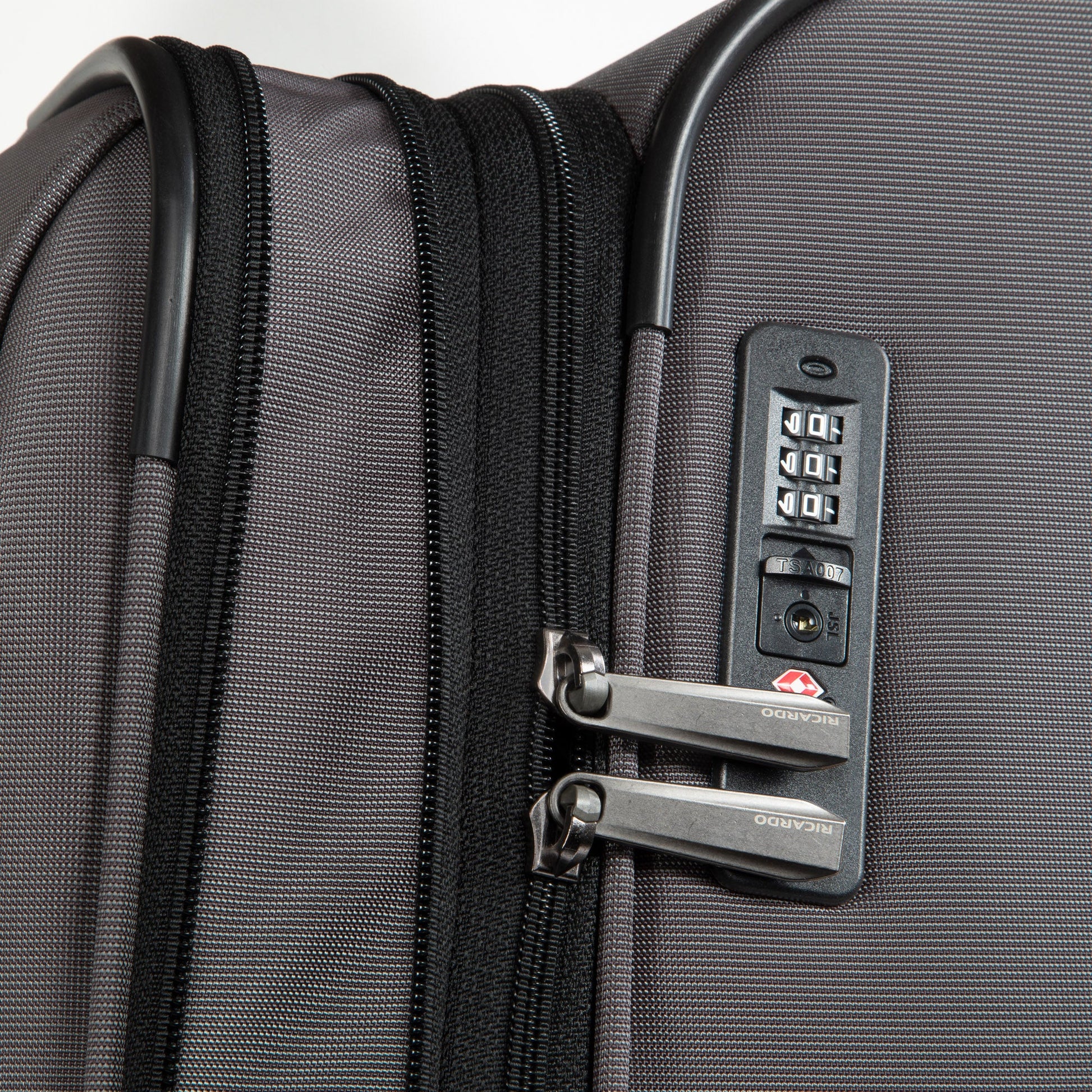 Close-up of the Ricardo Beverly Hills Montecito 3.0 Large Expandable Spinner with combo lock and secure zippers.