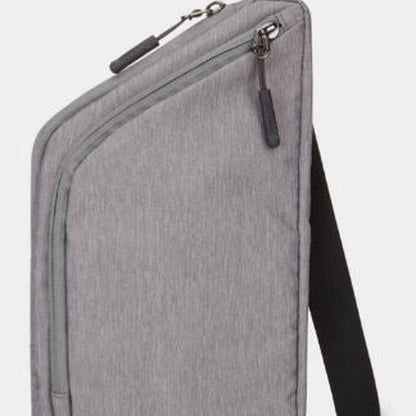 This Travelon World Travel Essentials Slim Crossbody Bag in gray is designed with a curved zipper pocket and an adjustable black strap, featuring the "Travelon" brand name at the bottom. Enjoy peace of mind on your travels with its RFID-protected design.