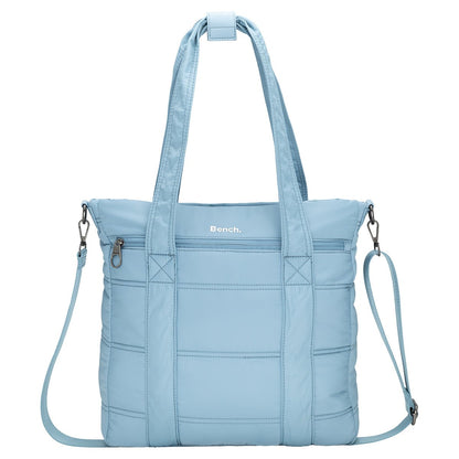Bench Georgia Satchel: light blue quilted bag with top handles, zip front pocket, and adjustable strap.