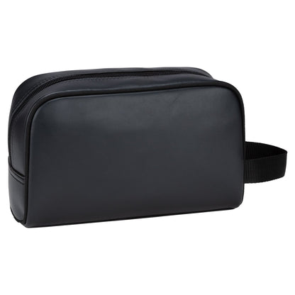 The Bench Jayce Toiletry Bag in black faux leather features a side handle, shown on a white background.