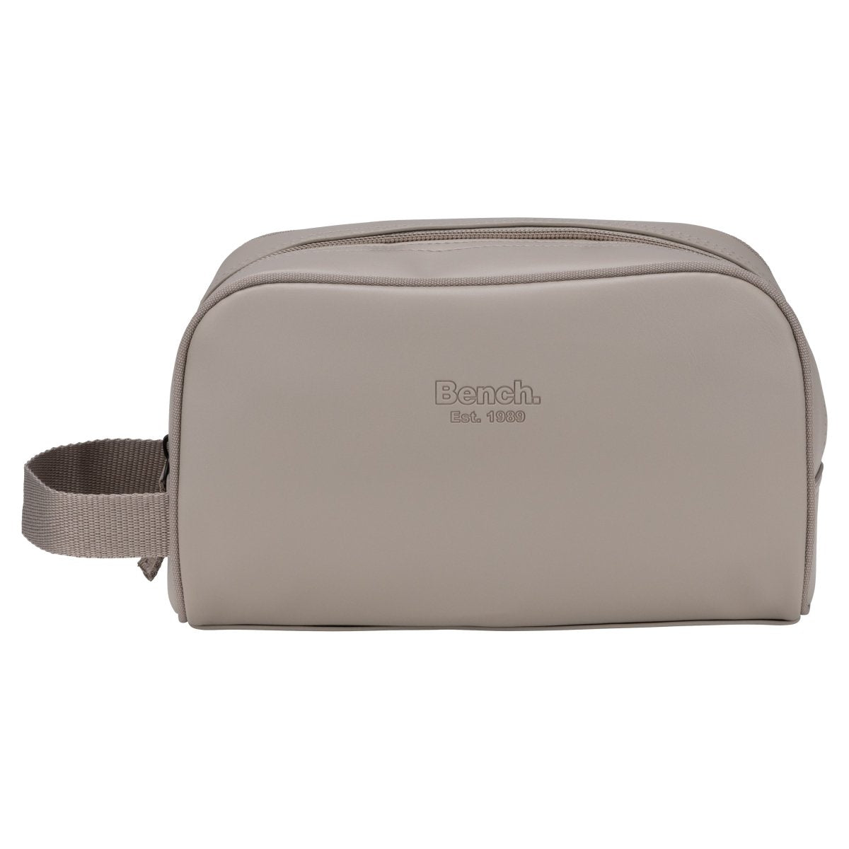 The Bench Jayce Toiletry Bag in taupe faux leather features a side handle and zipper, shown on white.