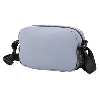 Bench Nylon Crossbody: blue bag with black adjustable strap and mesh pocket—compact for daily use.