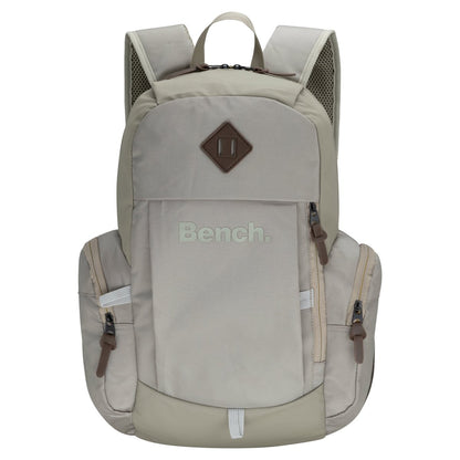 The Bench Terra Backpack is a light beige, durable bag with zippered pockets and padded straps.