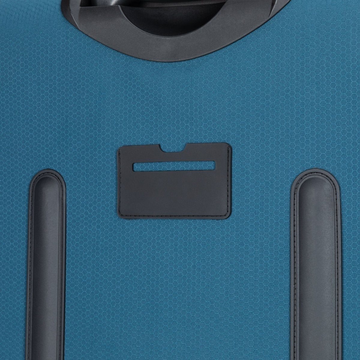 Close up of identification slot on back of teal Graphite Metamorph 28" Upright Rollaboard.