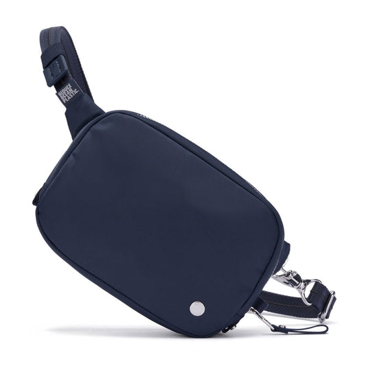 Product Image – Pacsafe® W Anti-theft Micro Sling: navy blue recycled polyester, RFID blocking, adjustable strap, metal details.
