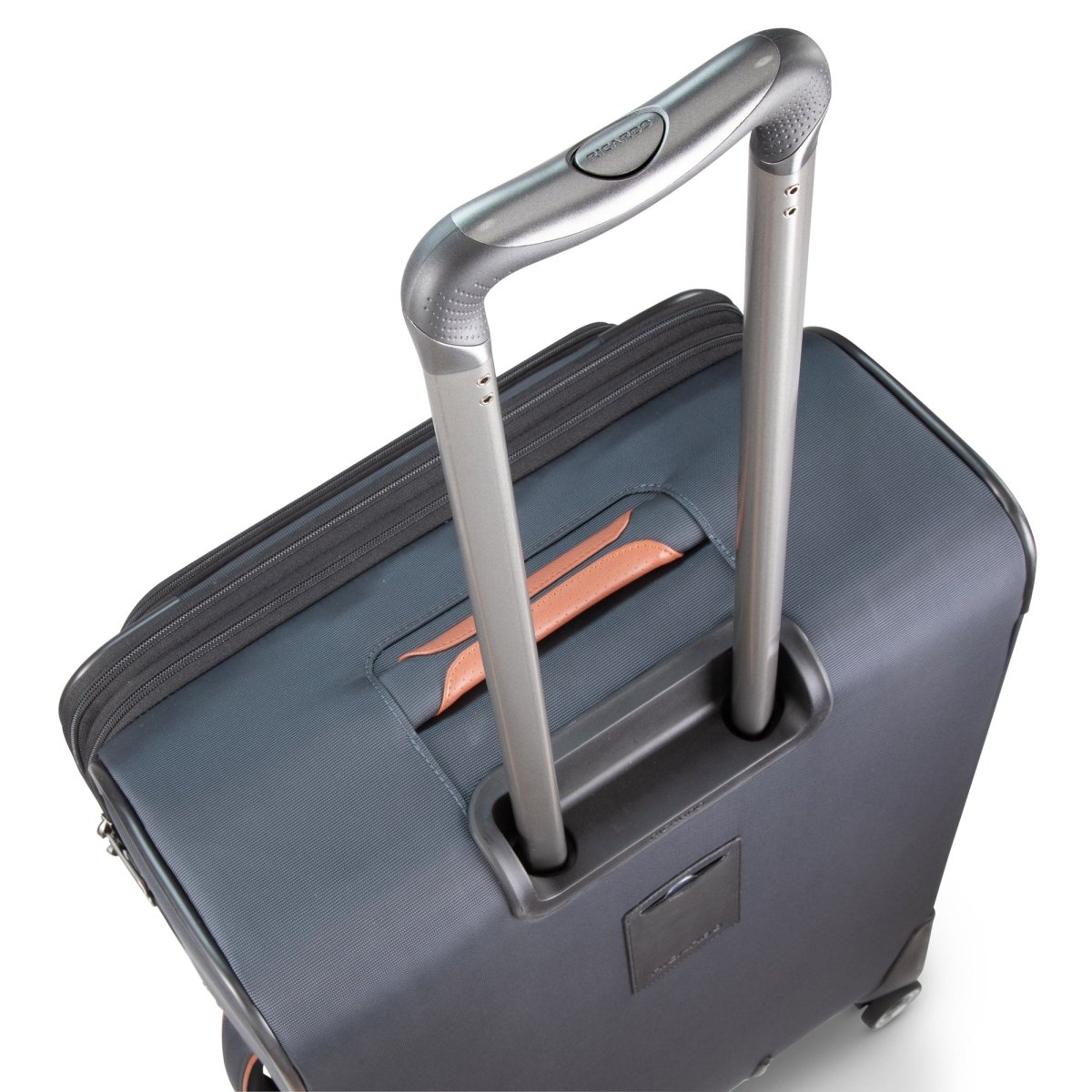 A close-up of the Ricardo Beverly Hills Montecito 3.0 Softside Carry-on with telescopic handle and leather accent.