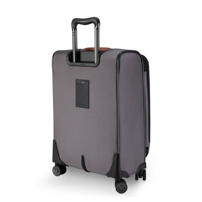 Ricardo Beverly Hills Montecito 3.0 gray softside carry-on with four wheels, black trim, and telescopic handle (back view).