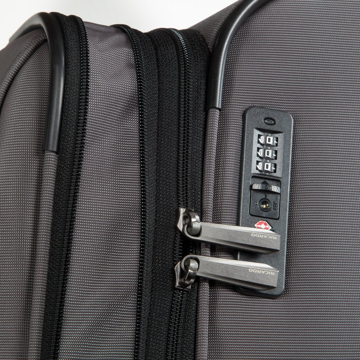 Close-up of the Ricardo Beverly Hills Montecito 3.0 Large Expandable Spinner with combo lock and secure zippers.