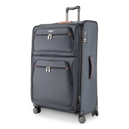 Product Image – Ricardo Beverly Hills Montecito 3.0 large black expandable spinner with two zip pockets and telescopic handle.