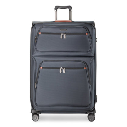 Ricardo Beverly Hills Montecito 3.0 Large navy expandable spinner with two zip pockets and telescoping handle.