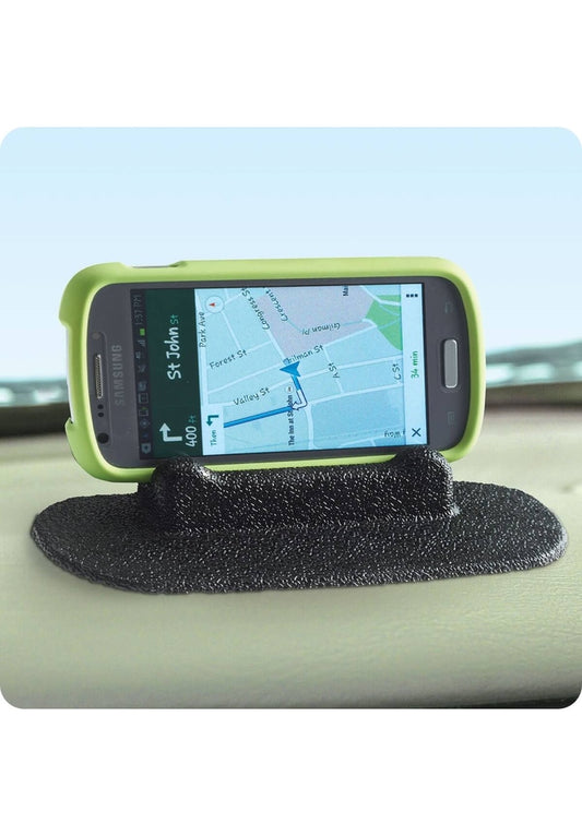 Product Image – Image showing product molded in black mounted on a vehicle dashboard and holding a smartphone displaying a GPS map.