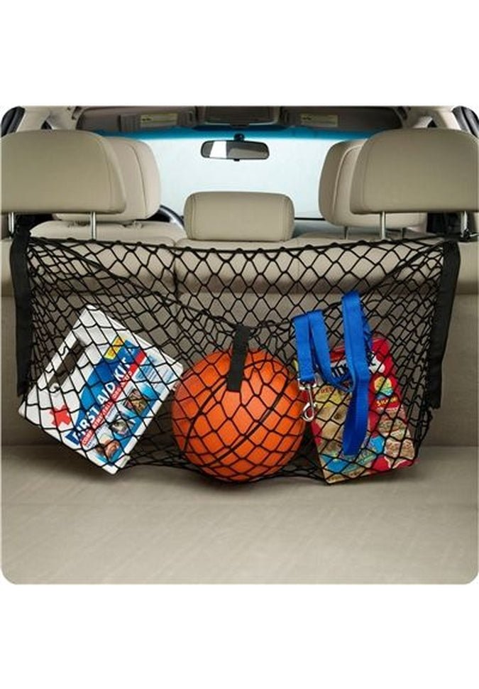 Image showing product in black netting installed in a vehicle with various items stored inside.