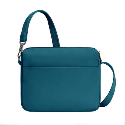 Back view of Travelon Roam Anti-theft Crossbody: capri blue, zippered top, front pocket, adjustable strap, lightweight nylon.