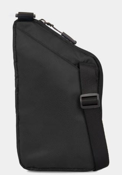 The Travelon World Travel Essentials Slim Crossbody Bag, shown from a side view, features an adjustable strap. Ideal for carrying your travel essentials, this stylish design provides RFID protection to ensure the safety of your valuables.