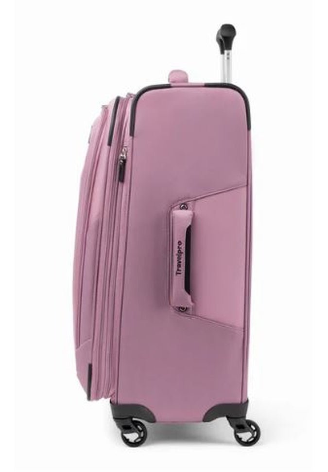 The Travelpro® Maxlite® 5 25" Expandable Spinner, in a pink hue, includes a telescopic handle, side handle, and zippered compartment, offering lightweight convenience with its 360° spinner wheels for easy maneuverability.