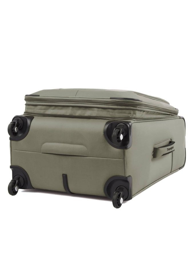 The Travelpro® Maxlite® 5 25" Expandable Spinner, a lightweight suitcase in green, is positioned on its side and equipped with 360° spinner wheels and a side handle for easy maneuverability.