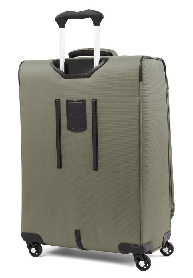 A Travelpro Maxlite 5 expandable spinner in green, featuring a black handle and 360° spinner wheels, positioned at an angle.