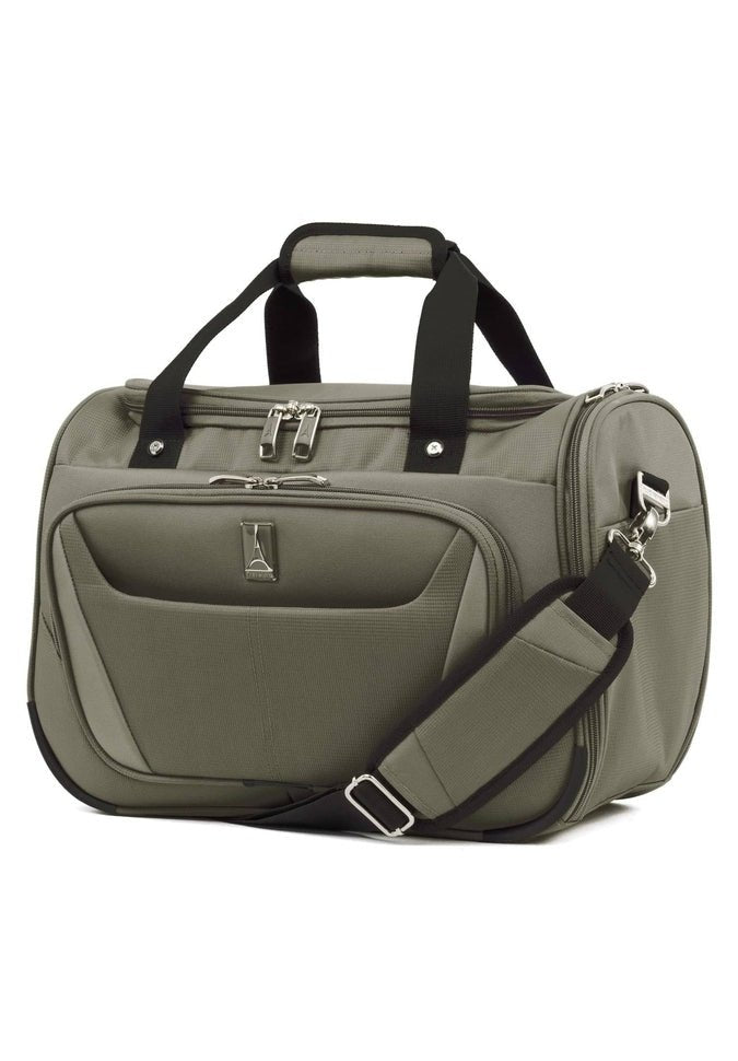 A slate green Travelpro® Maxlite® 5 Soft Tote with black straps and multiple zippered compartments is shown. The compact travel tote features dual handles, an adjustable shoulder strap, and a front pocket, making it ideal as an under-seat carry-on.