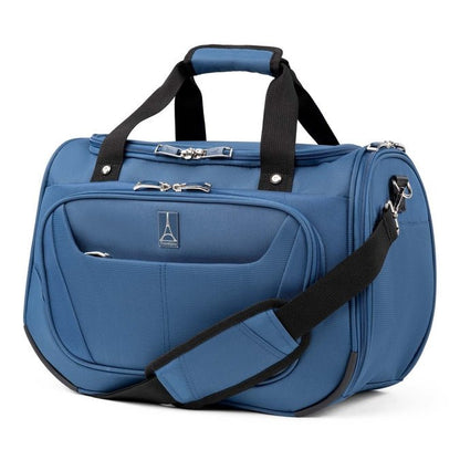 A large Maxlite 5 Soft Tote travel bag by Travelpro in Ensign Blue, featuring multiple compartments, black handles, and a detachable shoulder strap.