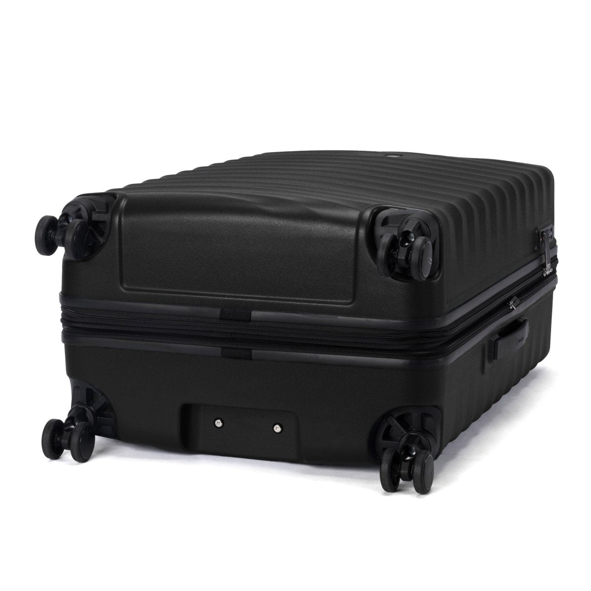 The Travelpro Maxlite Air V2 Large Hardside Spinner displays four wheels and a ribbed surface.