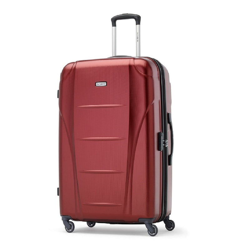 Image showing dark red luggage piece with silver and black carrying handle extended.