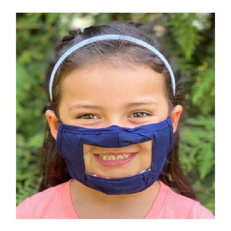 Image showing young girl wearing mask and smiling.